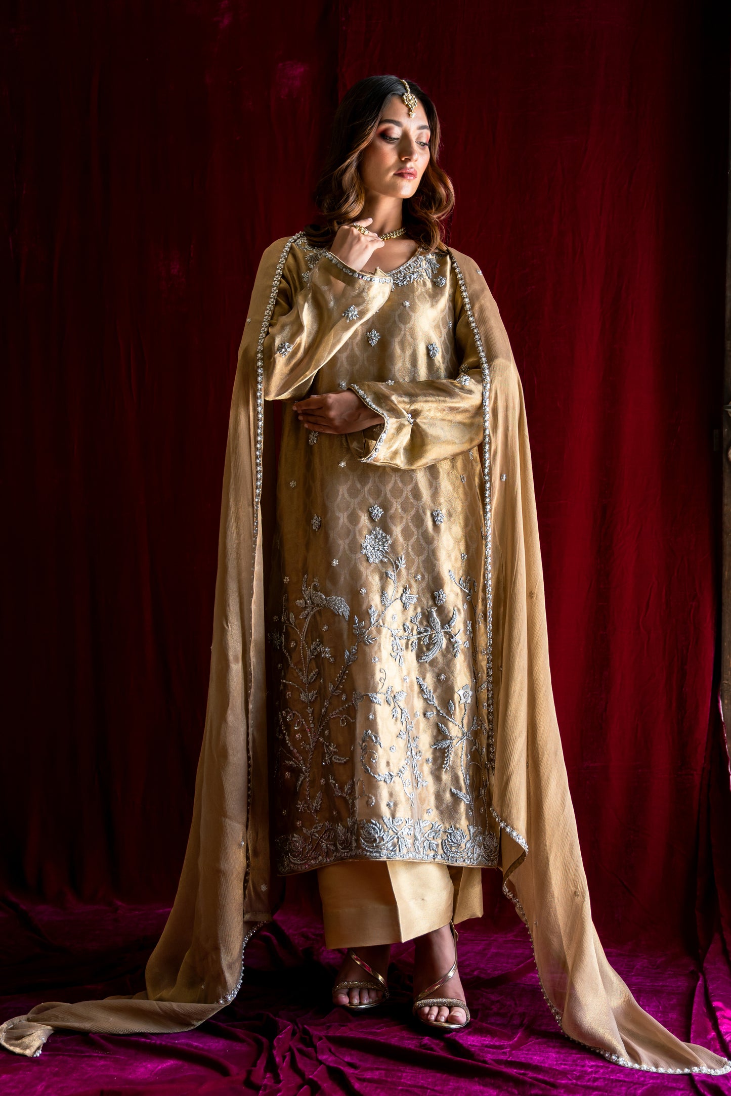REIGNING IN GOLD