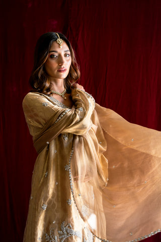REIGNING IN GOLD